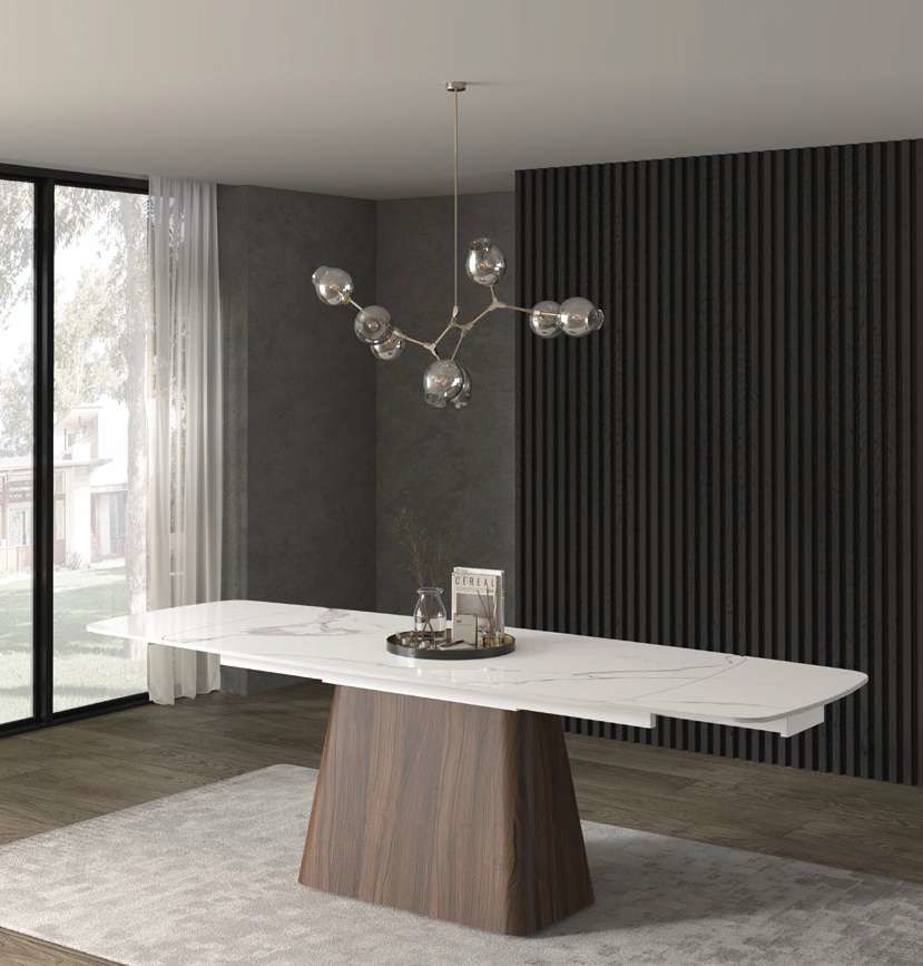 tavolo con piano arrotondato in ceramica bianco statuario lucido